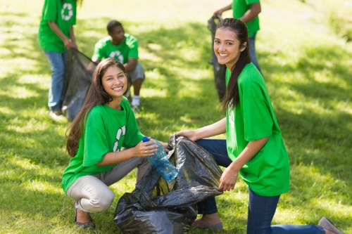 Professional waste clearance team handling construction debris