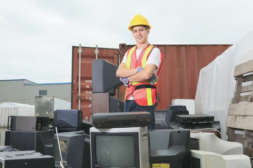 Large van handling warehouse waste in Bow industrial area